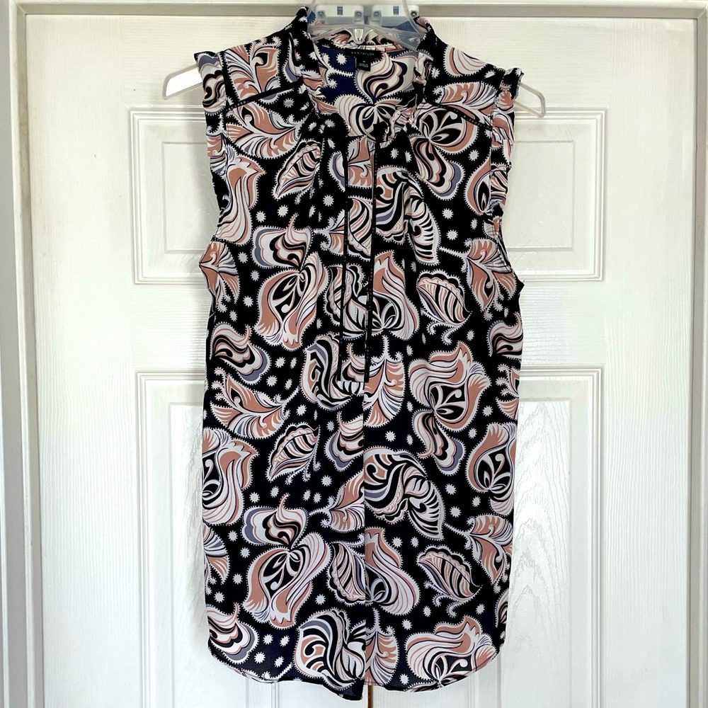 Ann Taylor sleeveless ruffle blouse with 1/4 button front